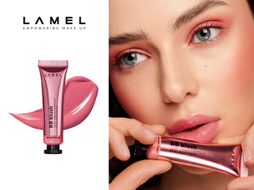 Girl applying brick-colored blush to her face